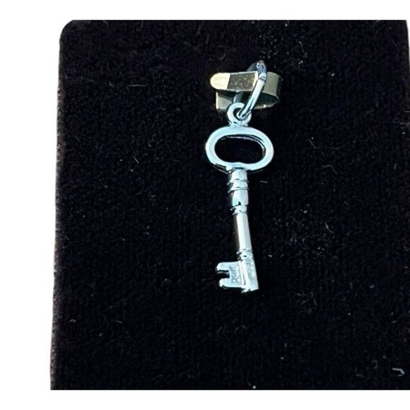 Rhodium Plated Sterling Silver Antique Skeleton Key Charm by Rembrandt - Picture 1 of 4